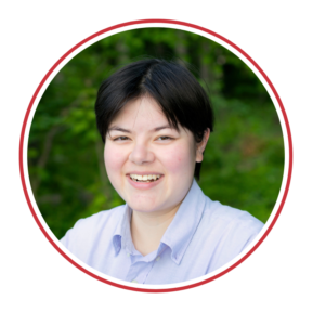 headshot of Carolyn Cheng with foliage background at Pearlstone Retreat Center 